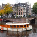 1 2 hour exclusive canal boat cruise w dutch snacks onboard bar 2 Hour Exclusive Canal Boat Cruise W/ Dutch Snacks & Onboard Bar