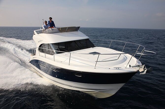 1 2 hour private sunset cruise on luxury motor boat with drinks 2 Hour Private Sunset Cruise on Luxury Motor Boat With Drinks