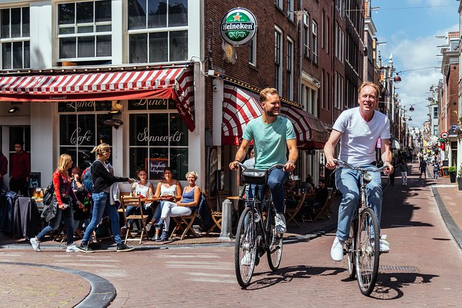 Amsterdam PRIVATE Bike Tour With Locals: Bike & Local Snack Included
