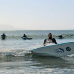 1 beginner surf lesson at te arai beach Beginner Surf Lesson at Te Arai Beach