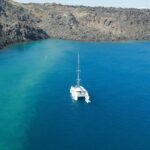 1 best of santorini private half day catamaran cruise with transfer and meal Best of Santorini Private Half-Day Catamaran Cruise With Transfer and Meal