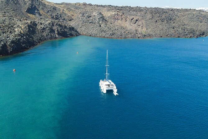 Best of Santorini Private Half-Day Catamaran Cruise With Transfer and Meal