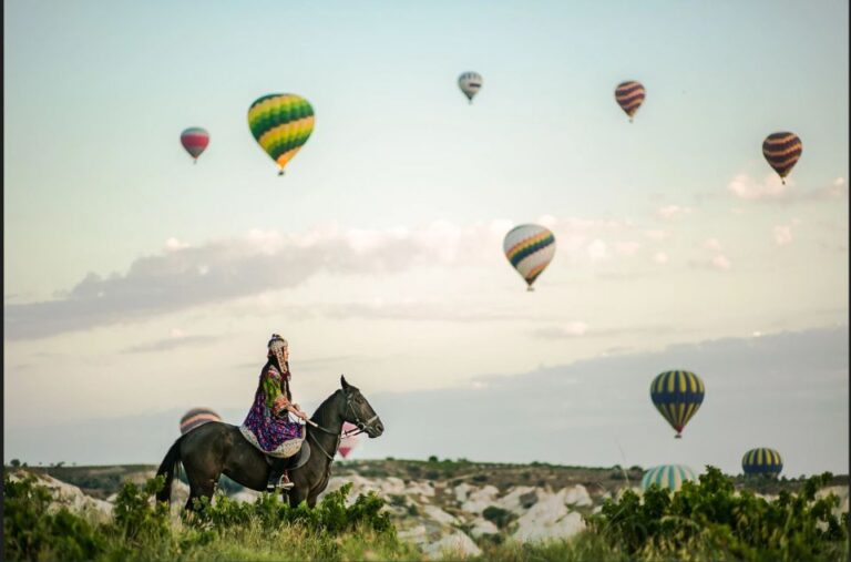 Cappadocia: Horse Riding With Balloons Above at Sunrise