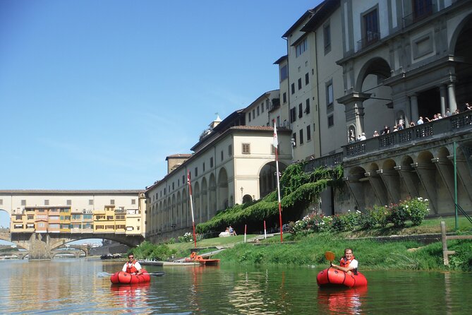 Kayak on the Arno River in Florence Under the Arches of the Old Bridge