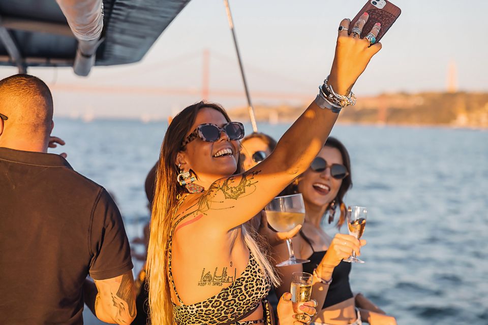 1 lisbon sunset catamaran tour with music and drink Lisbon: Sunset Catamaran Tour With Music and Drink