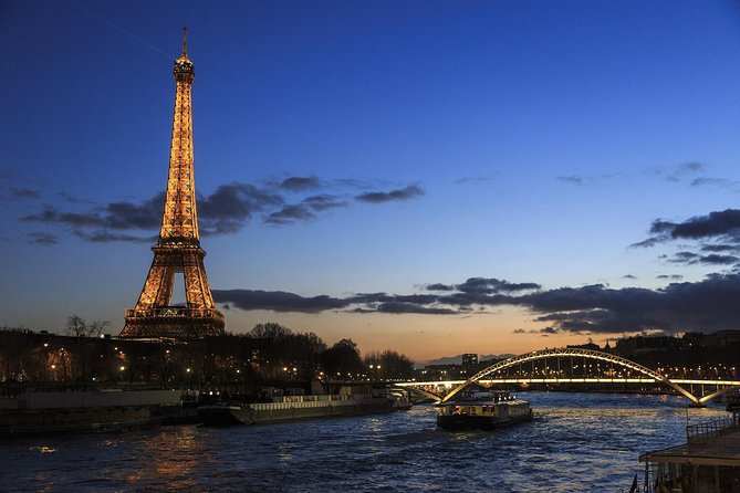 Paris by Night With Seine River Cruise and Roundtrip Luxury Transportation