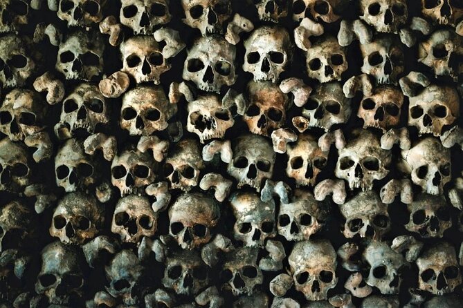 Paris: Catacombs With Audio Guide & Optional River Cruise