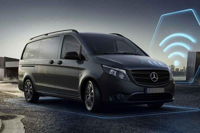 Private Transfer Madrid Barajas Airport to Madrid in Vans up to 7 Passengers