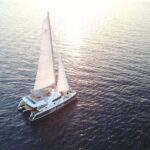 1 santorini luxury catamaran sunset cruise with bbq drink and transfer Santorini Luxury Catamaran Sunset Cruise With BBQ, Drink and Transfer