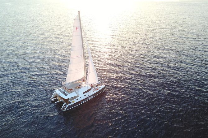 Santorini Luxury Catamaran Sunset Cruise With BBQ, Drink and Transfer