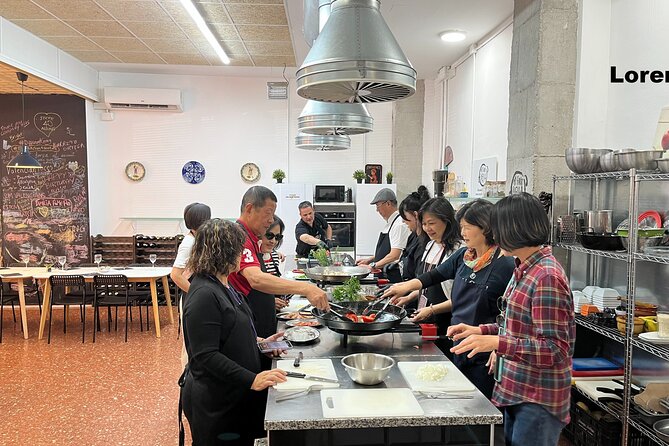 Seafood Paella Cooking Class, Tapas and Visit Market