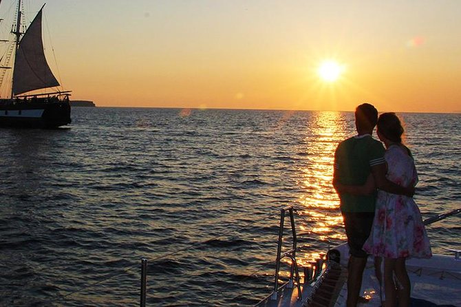 1 sunset sailing catamaran cruise in santorini with bbq and drinks Sunset Sailing Catamaran Cruise in Santorini With BBQ and Drinks