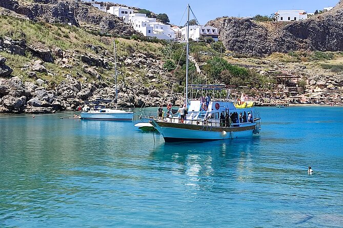 All Inclusive Bay to Bay Cruise in Lindos - Onboard Amenities and Activities