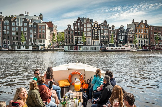 Amsterdam Canal Cruise With Live Guide and Onboard Bar - Experience Overview Highlights