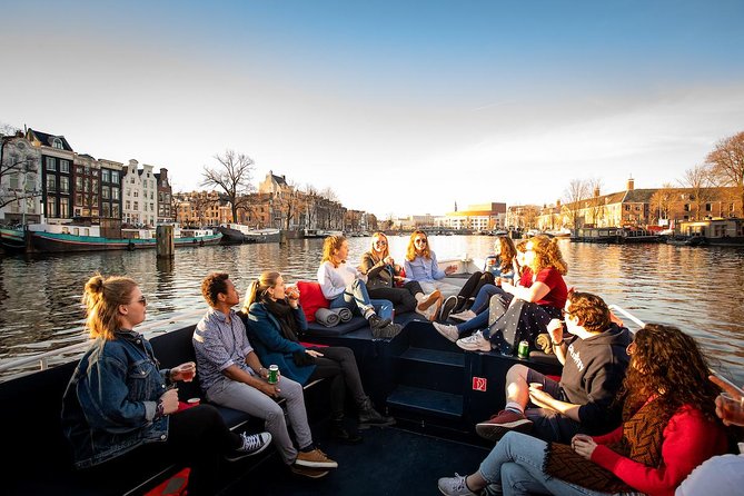 Amsterdam Canal Cruise With Live Guide and Unlimited Drinks - Cancellation Policy and Weather Considerations