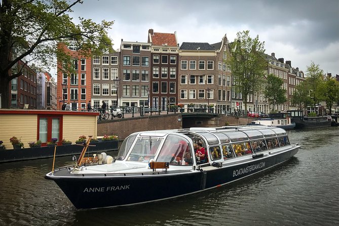 Amsterdam Canals Boat Tour With Audio Guide - Meeting Point and Logistics