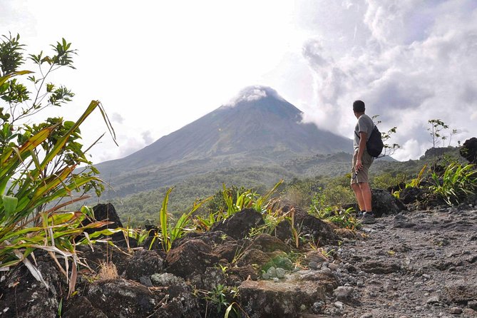 Arenal Highlights: Hanging Bridges, La Fortuna Waterfall, Volcano - Refreshing Dip at La Fortuna Waterfall