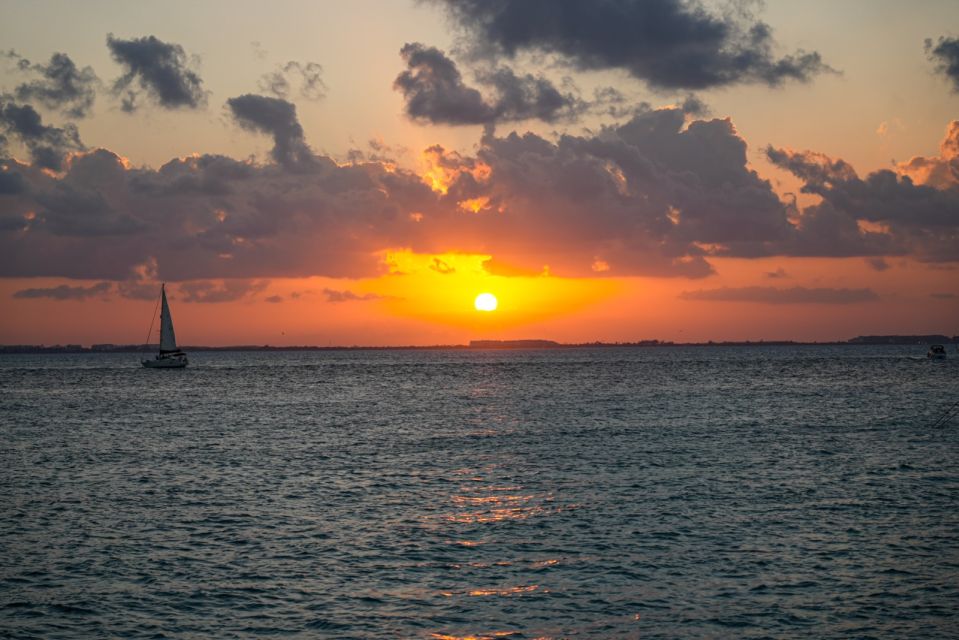 From Cancún: Isla Mujeres Sunset Catamaran Cruise - Highlights