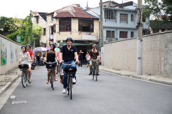 Half-Day Bike Tour of Shanghai Old Town With Food Tasting - Weather Policy