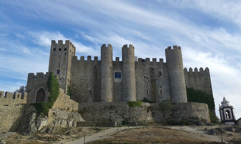 Lisbon: 1-Way Porto Transfer W/Obidos, Nazare & Fatima Stops - Experience Highlights