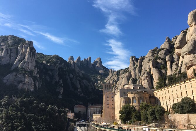 Montserrat Land of Shrines - One Day Small Group Hiking Tour From Barcelona - Tour Guide Expertise and Services