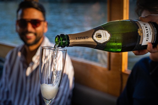 Private Boat Tour: Champagne Canal Cruise in Amsterdam - Meeting Point and Pickup Information