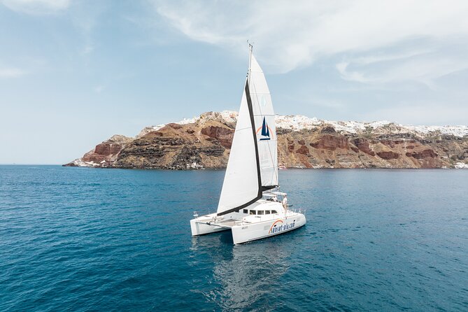 Private Morning Tour Lagoon 400-380 Sailing in Santorini ,Lunch, Drink, Transfer - Cancellation Policy