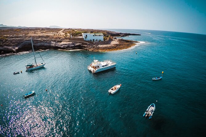 Tenerife Sunset Catamaran Tour With Transfer - Food and Drinks Included. - Location and Accessibility