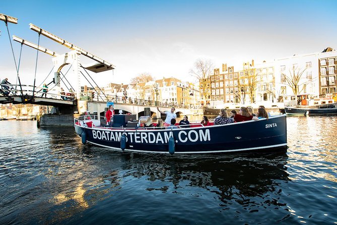 Amsterdam 1-Hour Sightseeing Canal Cruise With Live Guide - Experience Highlights