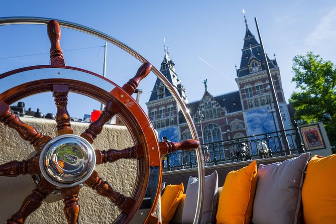 Amsterdam Canal Cruise With Live Guide and Onboard Bar - Cancellation Policy and Assistance