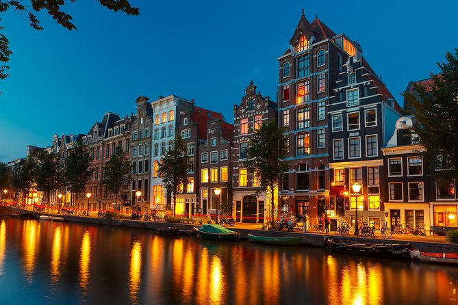 Amsterdam Evening Canal Cruise With Live Guide and Onboard Bar - Itinerary and Meeting Points