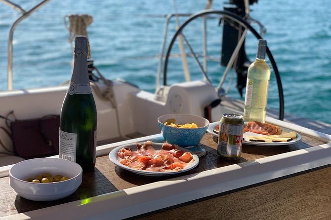 Barcelona Sunset Cruise With Light Snacks and Open Bar - Onboard Refreshments