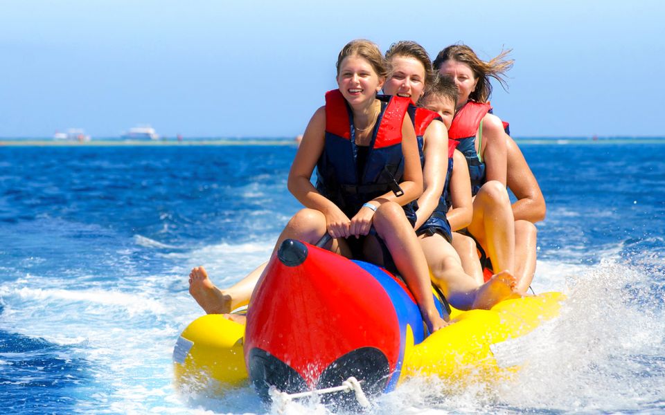 From Sharm: Parasailing, Glass Boat, Watersports, and Lunch - Activity Description