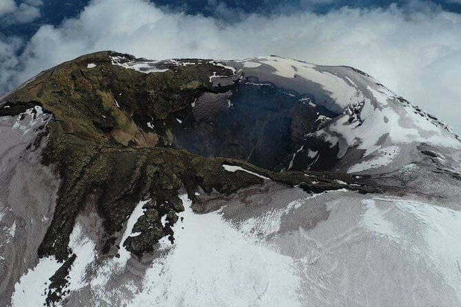 Full Day Mountaineering to Villarrica Volcano From Pucón - Cancellation Policy and Weather Considerations