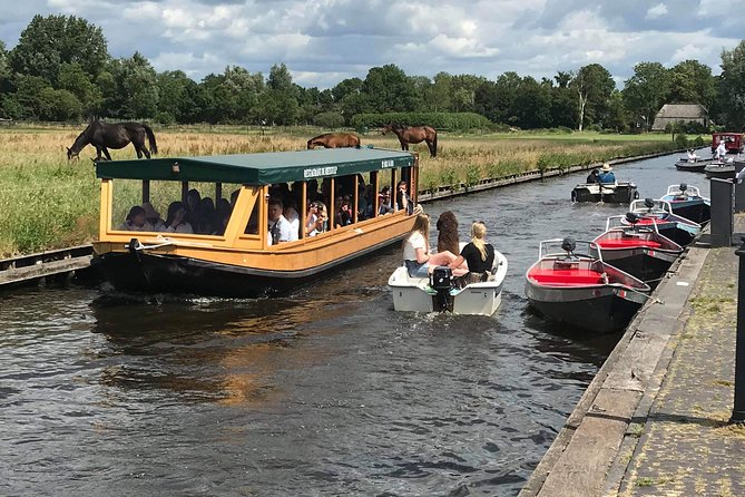 Giethoorn and Zaanse Schans Windmills Day Trip From Amsterdam - Pricing and Operator Information