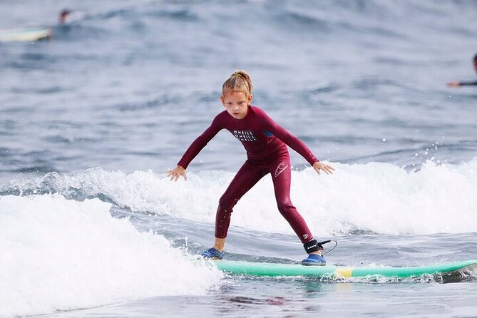 Group Surf Class in Playa De Las Américas With Photographs - Cancellation Policy