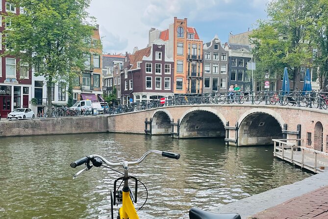 Highlights & Hidden Streets Bike Tour Amsterdam - Local Insights