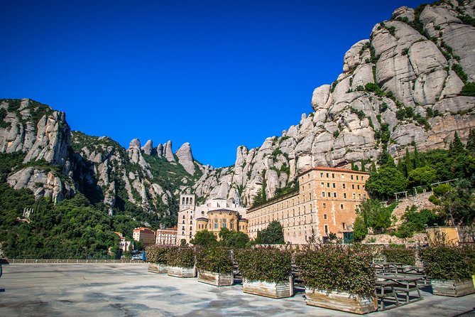 Montserrat Half Day & Optional Sagrada Familia Small Group Tour - Meeting and Pickup