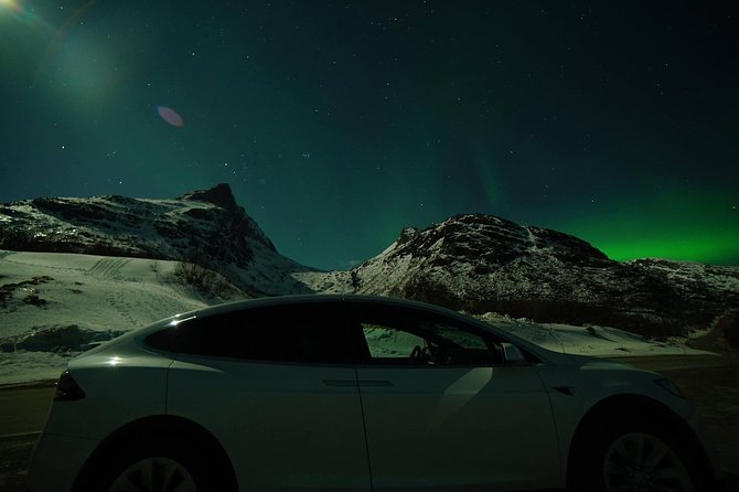 Northern Lights - Teslax Ecofriendly Car - Traveler Photos Access
