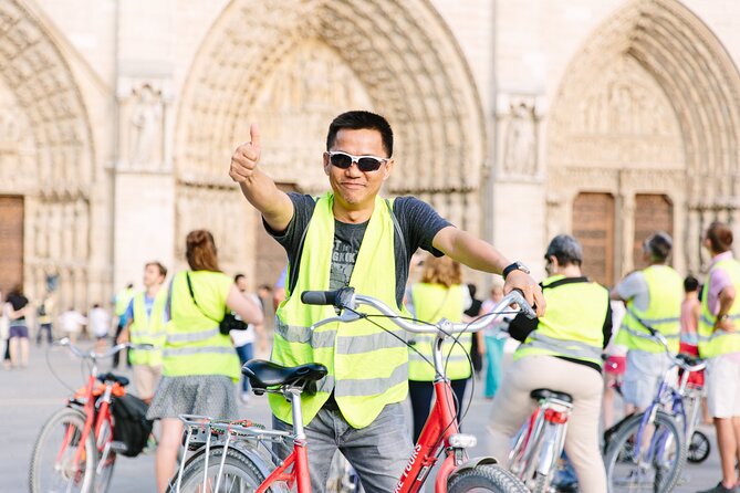 Paris by Night City of Lights Sightseeing Guided Bike Tour - Booking Details and Pricing