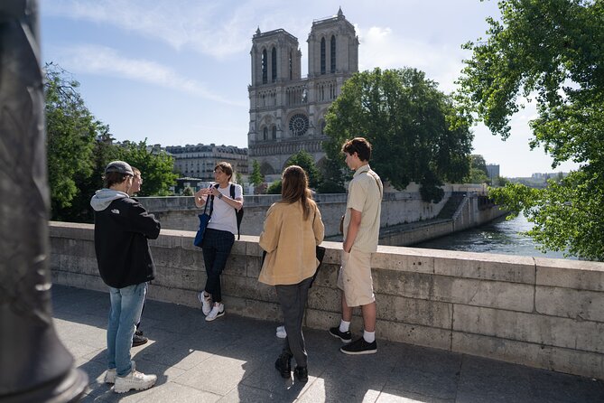 Paris Iconic Neighborhoods Guided Walking Tour - Meeting Points and Group Size