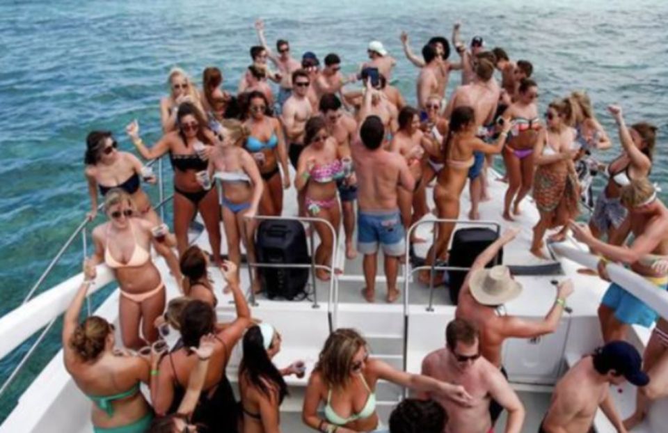 Party Boat in Catamaran Trinity Snorkeling Private Beach - Highlights