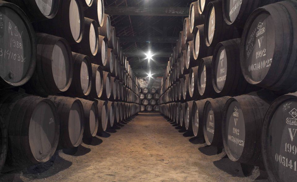 Porto: Graham's Port Lodge Tour With Premium Wine Tastings - Lodge Highlights and Production Process