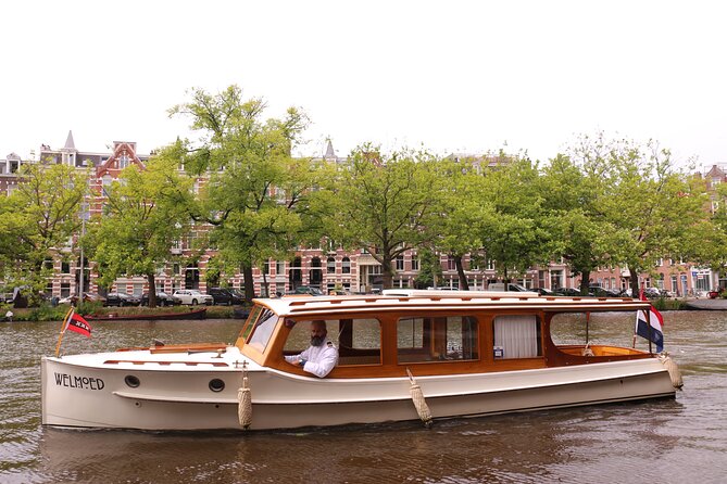Private Guided Historic Amsterdam Canal Cruise in a Salon Boat - Booking Information