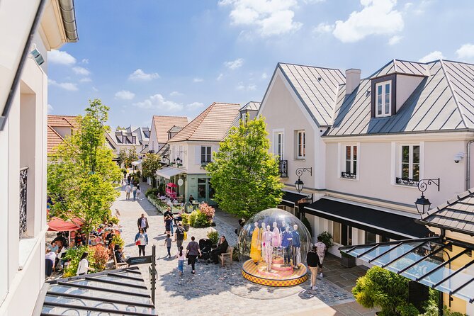 Shopping Outlet La Vallée Village Round-Trip Transport From Paris - Logistics and Additional Information