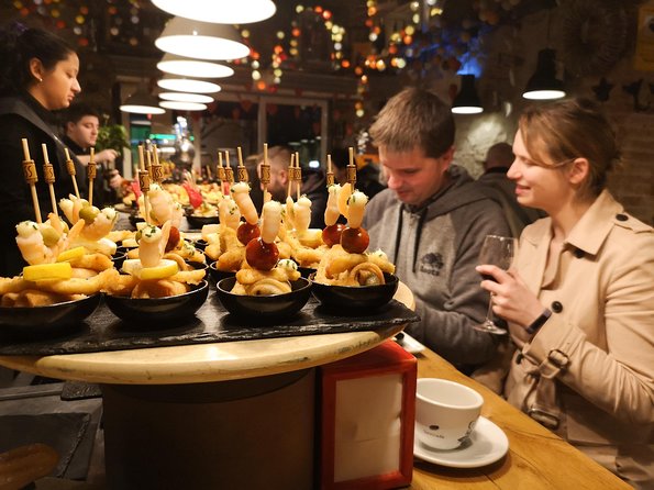 The Most Complete Food & Drink Tasting Tour of Barcelona in Traditional Taverns - Cultural Insights Shared