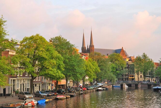 Amsterdam Canal Cruise With Live Guide and Onboard Bar - Meeting and Pickup Logistics