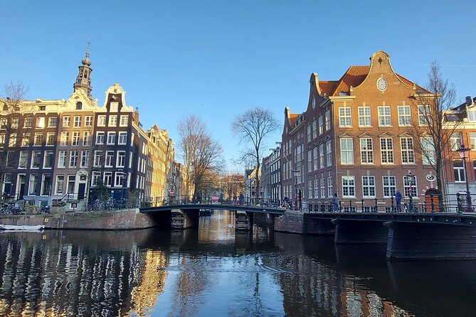 Amsterdam: Walking Tour, Canal Cruise and Transfer - Pricing and Booking Information