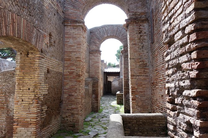 Ancient Ostia Antica Semi-Private Day Trip From Rome by Train With Guide - Cancellation Policy and Reviews