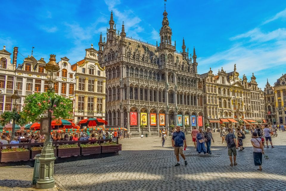 Brussels: Highlights Walking and Bus Tour With Waffle - Expert Guide Insights